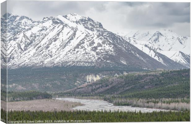 Matanuska River with snow covered mountains behind in Alaska, USA Canvas Print by Dave Collins