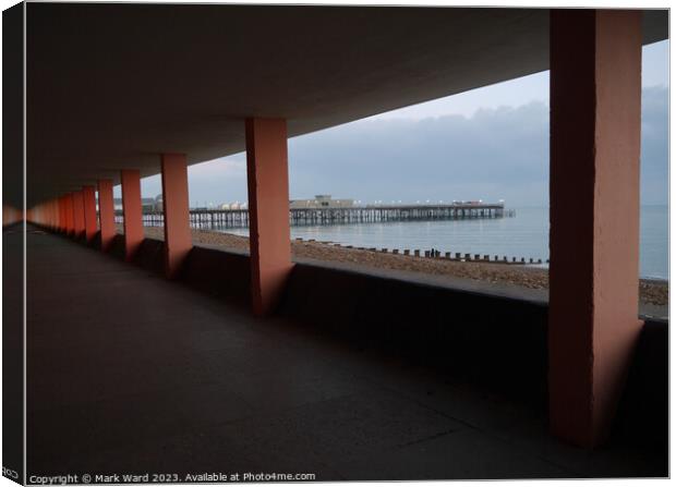 Hastings Pier through Bottle Alley. Canvas Print by Mark Ward