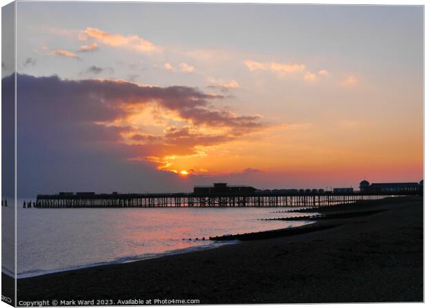 December Sunset over Hastings Pier. Canvas Print by Mark Ward
