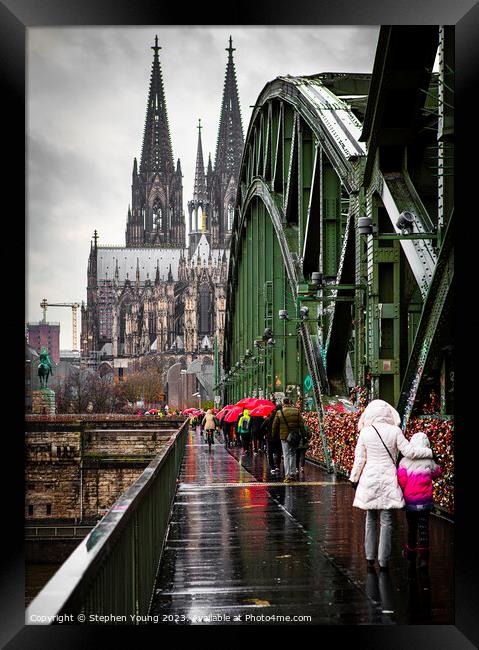 Rainy Day Crossing the Hohenzollern Bridge, Cologne, Germany Framed Print by Stephen Young