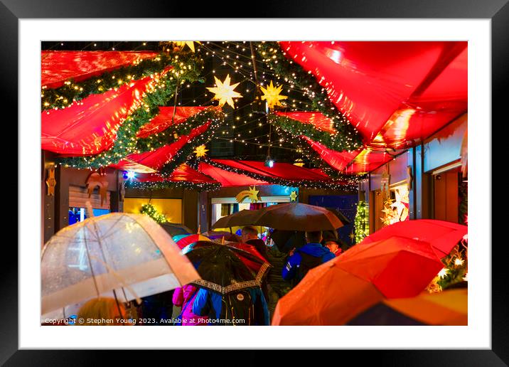 Cologne Christmas: Rain-kissed Umbrellas Framed Mounted Print by Stephen Young