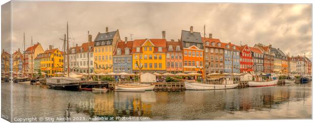 panorama of Nyhavn with colorful houses and boats moored at the  Canvas Print by Stig Alenäs