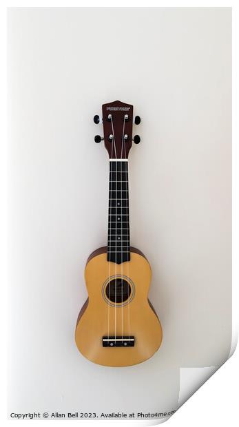  Ukulele hanging on wall Print by Allan Bell
