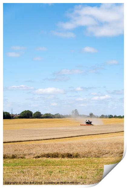Combine harvester reaping a wheat crop Print by Allan Bell