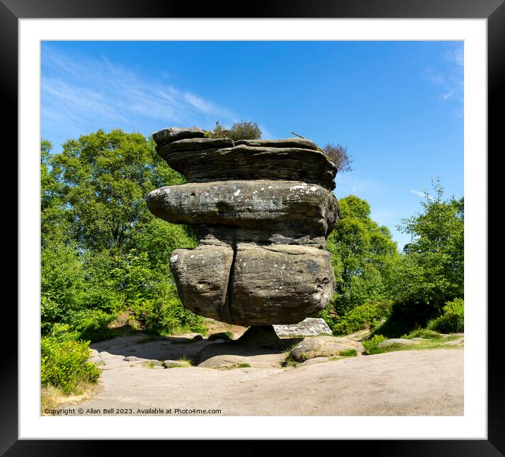 Finely balanced stack Framed Mounted Print by Allan Bell