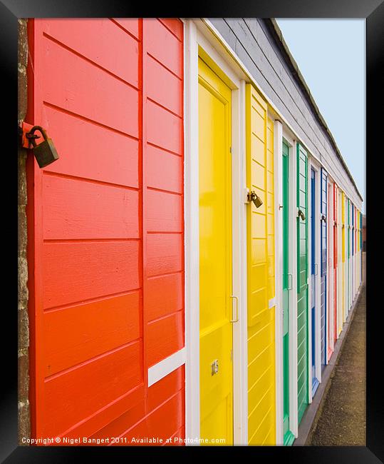 Colourful Beach Huts Framed Print by Nigel Bangert