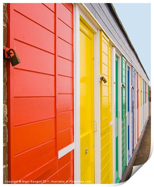 Colourful Beach Huts Print by Nigel Bangert