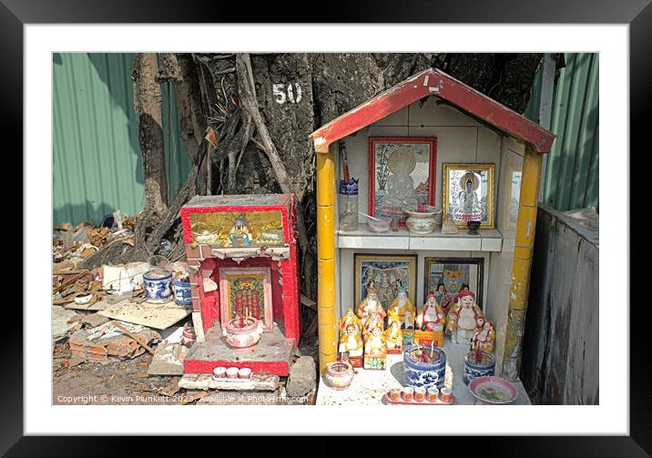 Street side temple worship. Ho Chi Minh City Vietnam Framed Mounted Print by Kevin Plunkett