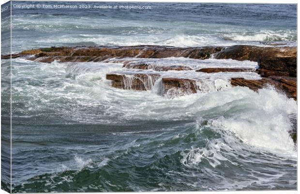 Waves on Rocks Canvas Print by Tom McPherson