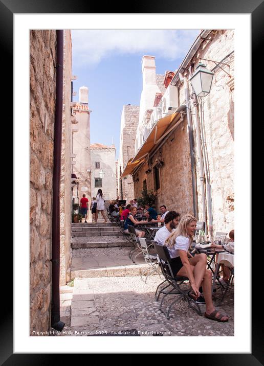 Enjoying life outside in Dubrovnik Croatia  Framed Mounted Print by Holly Burgess