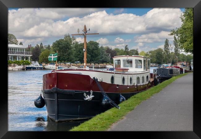 Barge moored on the River Thames in Henley  Framed Print by Kevin Hellon