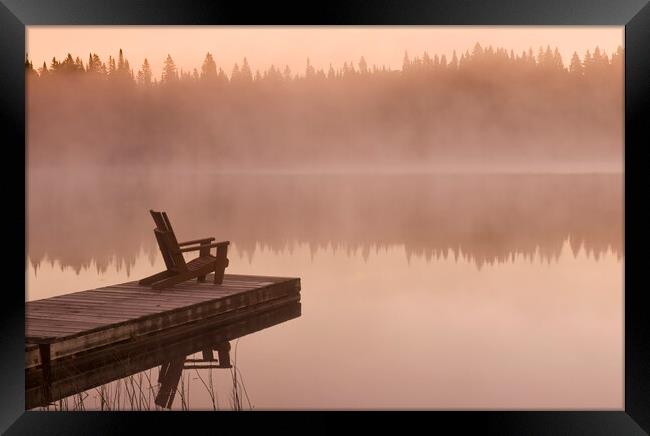 chair on dock, Glad Lake, Duck Mountain Provincial Park Framed Print by Dave Reede