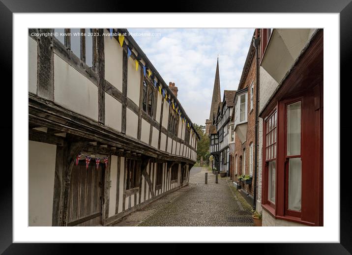 Cobbled street of Ledbury showing support with the colors of Ukr Framed Mounted Print by Kevin White