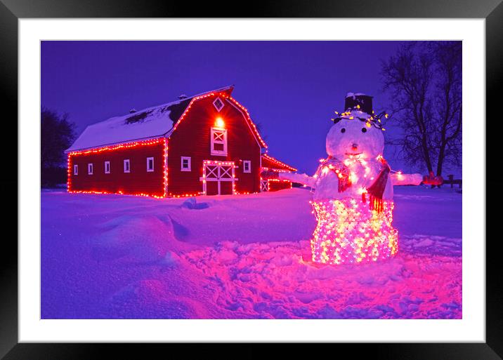 snowman in Front of Red barn Framed Mounted Print by Dave Reede