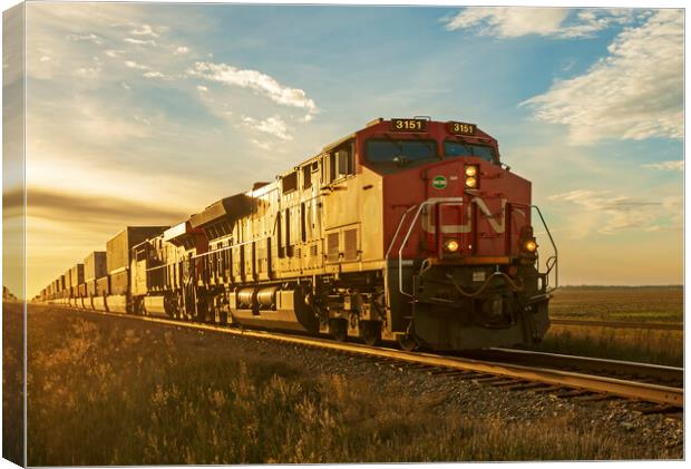locomotives pulling shipping containers Canvas Print by Dave Reede