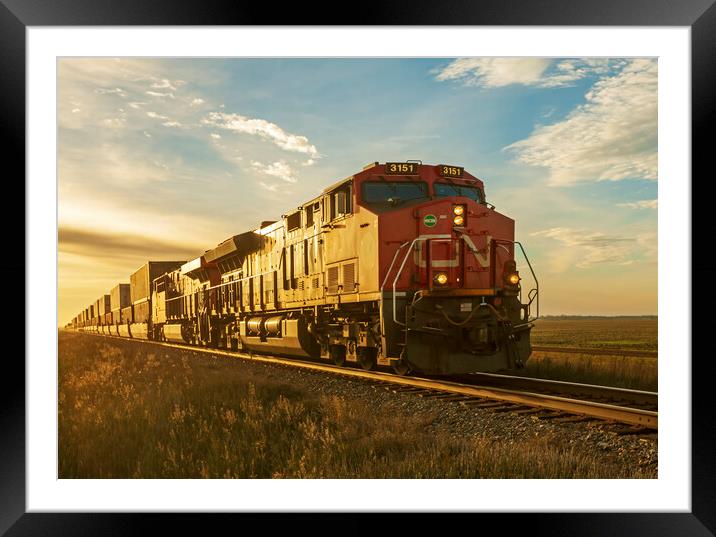 locomotives pulling shipping containers Framed Mounted Print by Dave Reede