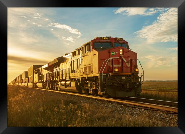 locomotives pulling shipping containers Framed Print by Dave Reede