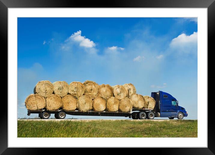 Trucking the Bales Framed Mounted Print by Dave Reede
