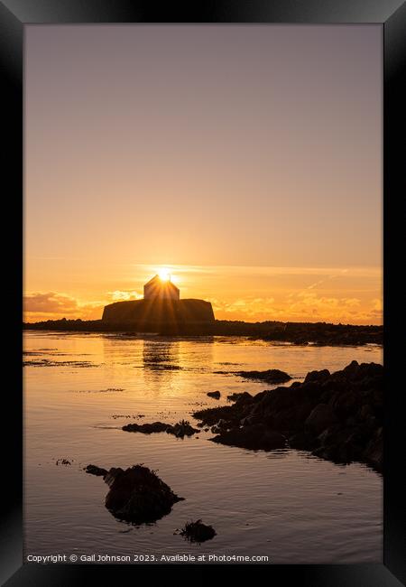 Sunset at the church on the island - St Cwyfan's Anglesey  Framed Print by Gail Johnson