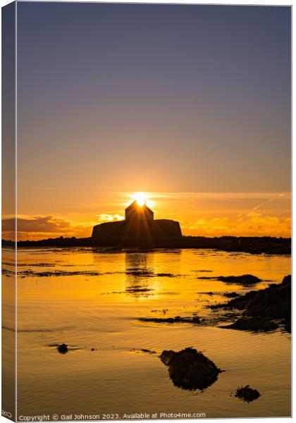 Sunset at the church on the island - St Cwyfan's Anglesey  Canvas Print by Gail Johnson