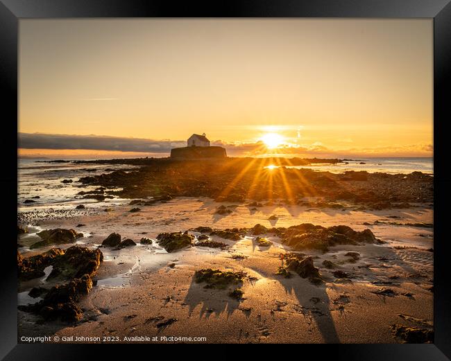 Sunset at the church on the island - St Cwyfan's Anglesey  Framed Print by Gail Johnson