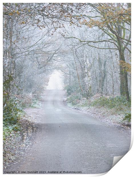 Frosty woodland road Print by Alan Dunnett