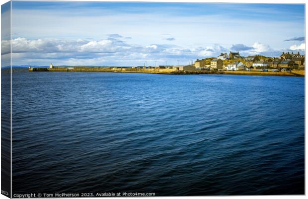 Seascape view of Burghead village Canvas Print by Tom McPherson
