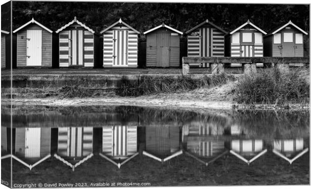 Lowestoft Beach Hut Reflections Canvas Print by David Powley