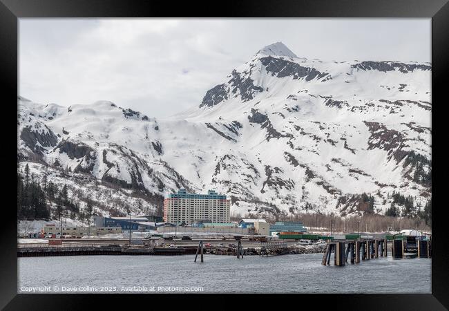 The Begich Towers Condominium building and snow covered mountains behind, Whittier, Alaska, USA Framed Print by Dave Collins