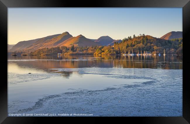 First Light over an Icy Derwentwater Framed Print by Janet Carmichael