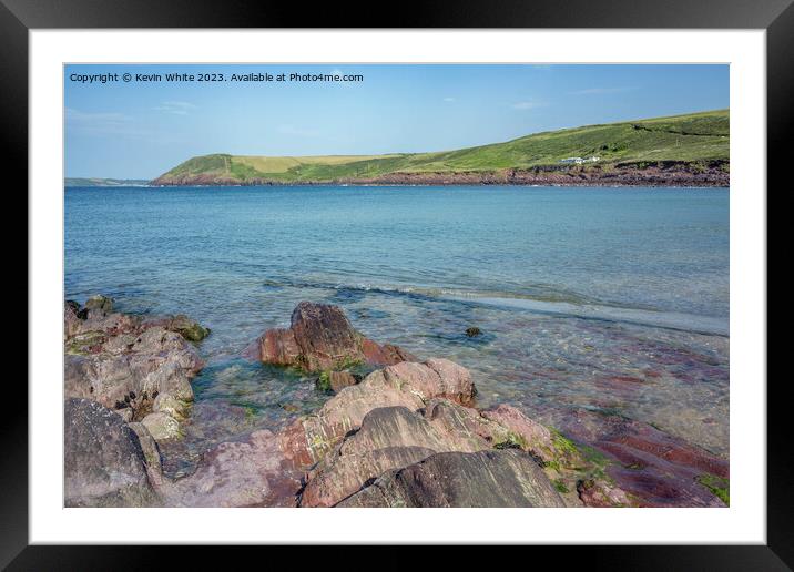 Interesting different coloured rocks on Manorbier beach Framed Mounted Print by Kevin White