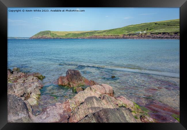 Interesting different coloured rocks on Manorbier beach Framed Print by Kevin White