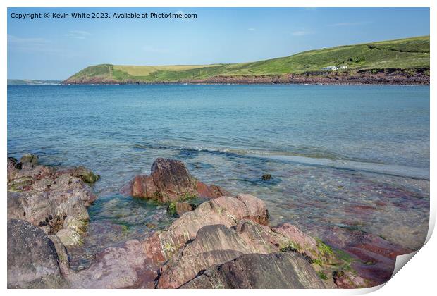 Interesting different coloured rocks on Manorbier beach Print by Kevin White