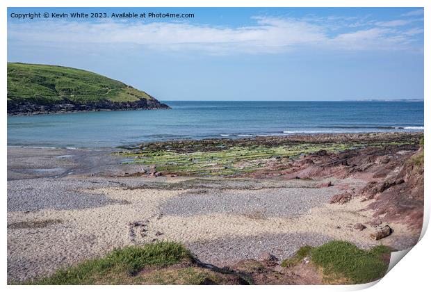 Sand and rocky beach at Manorbier South Wales Print by Kevin White