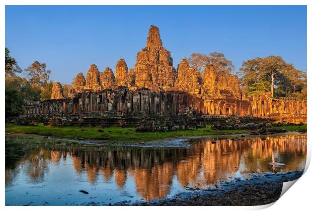 Bayon Temple At Sunset In Cambodia Print by Artur Bogacki