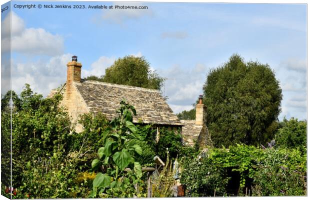 Stone Cottage in the Cotswolds Village of Guiting Power Gloucestershire Canvas Print by Nick Jenkins