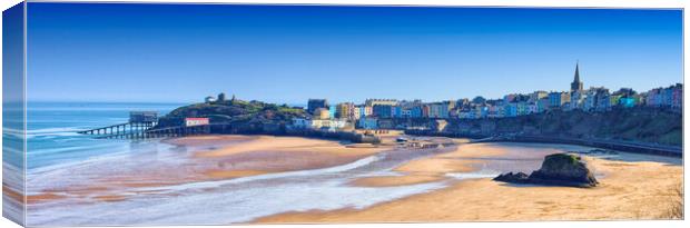 A panoramic view of the harbour and beach and town skyline of Tenby in south Wales UK  Canvas Print by John Gilham