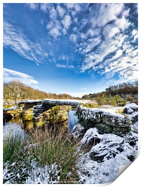 Dartmoor clapper bridge in the snow Print by Roger Mechan
