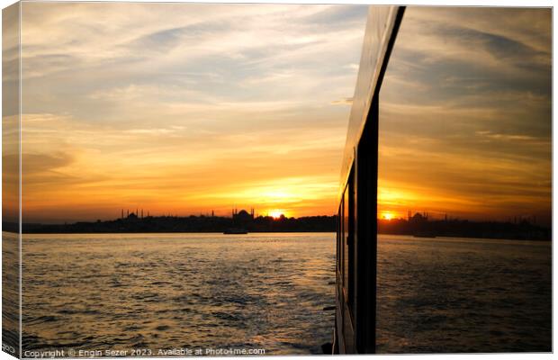 A sunset in Istanbul with the reflection Canvas Print by Engin Sezer