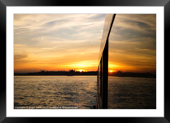 A sunset in Istanbul with the reflection Framed Mounted Print by Engin Sezer
