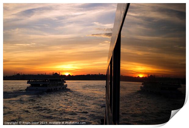 A sunset in Istanbul with the reflections on a boats windows 2 Print by Engin Sezer
