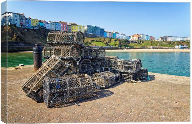 Lobster Pots on Tenby Harbour in South Wales UK Canvas Print by John Gilham