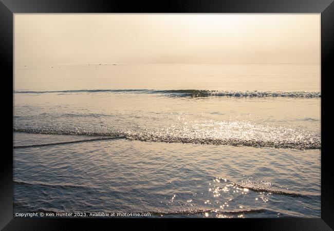 Morning Fog and Lapping Tide  Framed Print by Ken Hunter