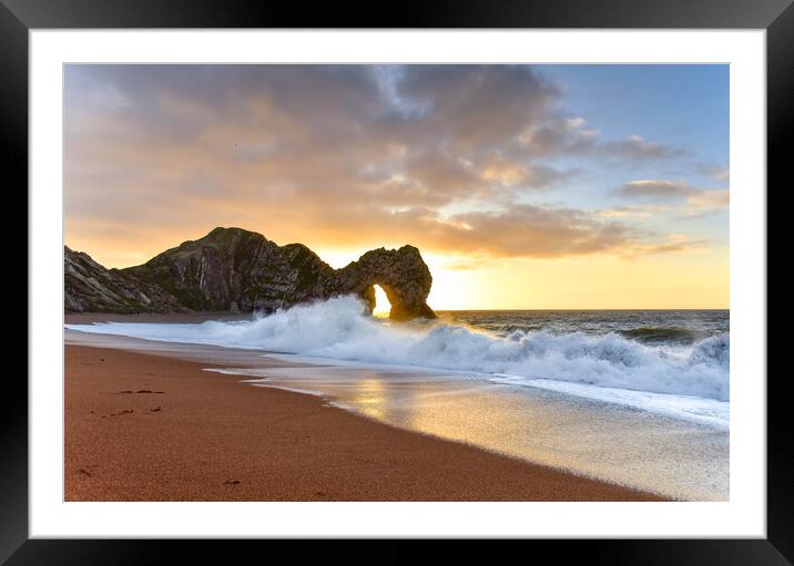Sunrise through the arch of Durdle Door  Framed Mounted Print by Shaun Jacobs