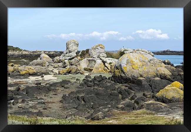Rocks at low tide Iles Chausey Framed Print by Gary Eason