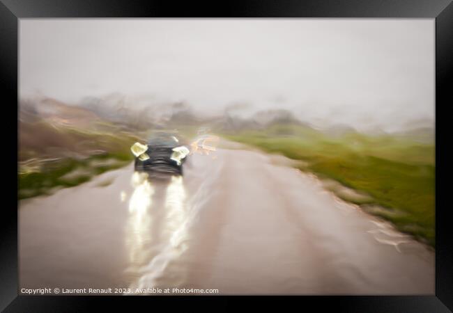 Driving during the rain, producing an impressionistic effect and Framed Print by Laurent Renault