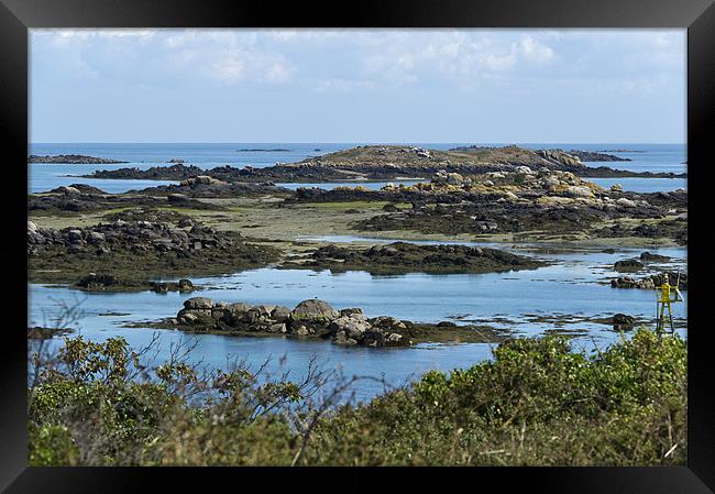 Low tide rocks Iles Chausey Framed Print by Gary Eason