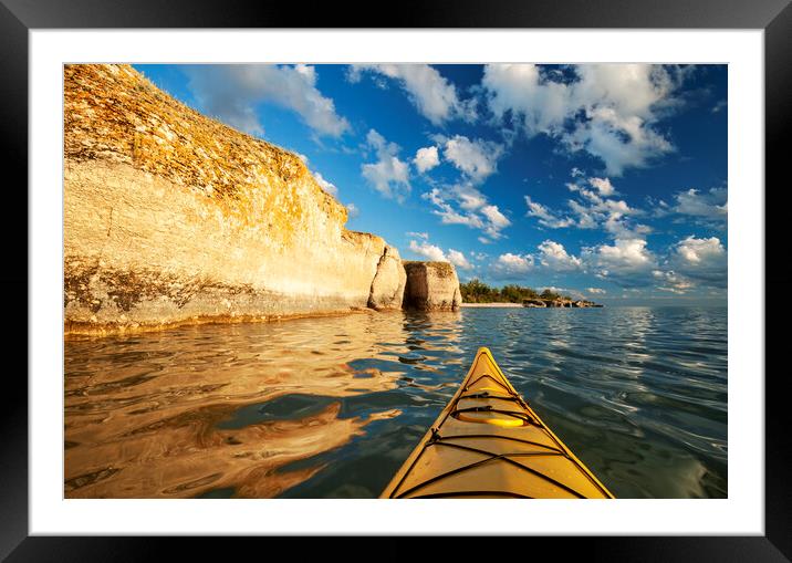 kayaking along limestone cliffs Framed Mounted Print by Dave Reede