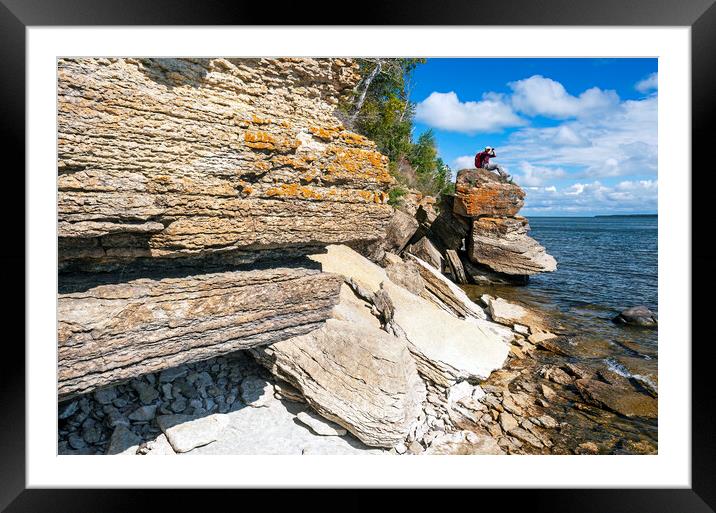 hiker  along  cliffs Framed Mounted Print by Dave Reede