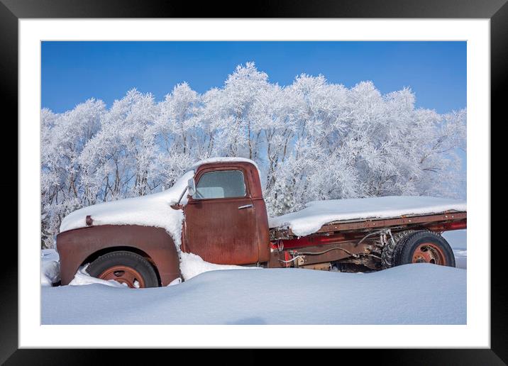 old truck in the snow Framed Mounted Print by Dave Reede